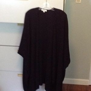 Large enveloping 100% sleeveless cashmere sweater
